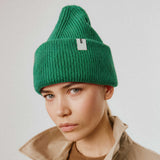 Kelly Green Beanie 01 oversized rib-knit merino wool beanie with double cuff worn on model
