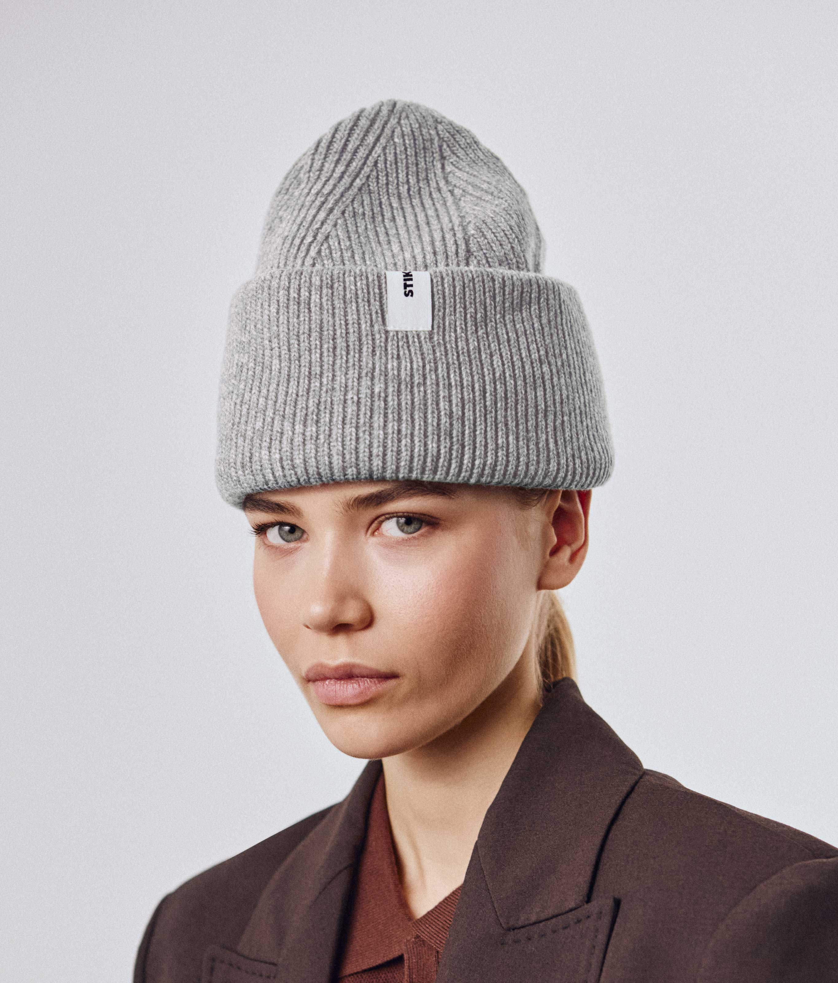 Light Grey Beanie 01 oversized rib-knit merino wool beanie with double cuff worn on model