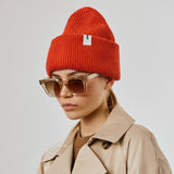 Orange Beanie 01 oversized rib-knit merino wool beanie with double cuff worn on model
