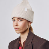 White Beanie 01 oversized rib-knit merino wool beanie with double cuff worn on model