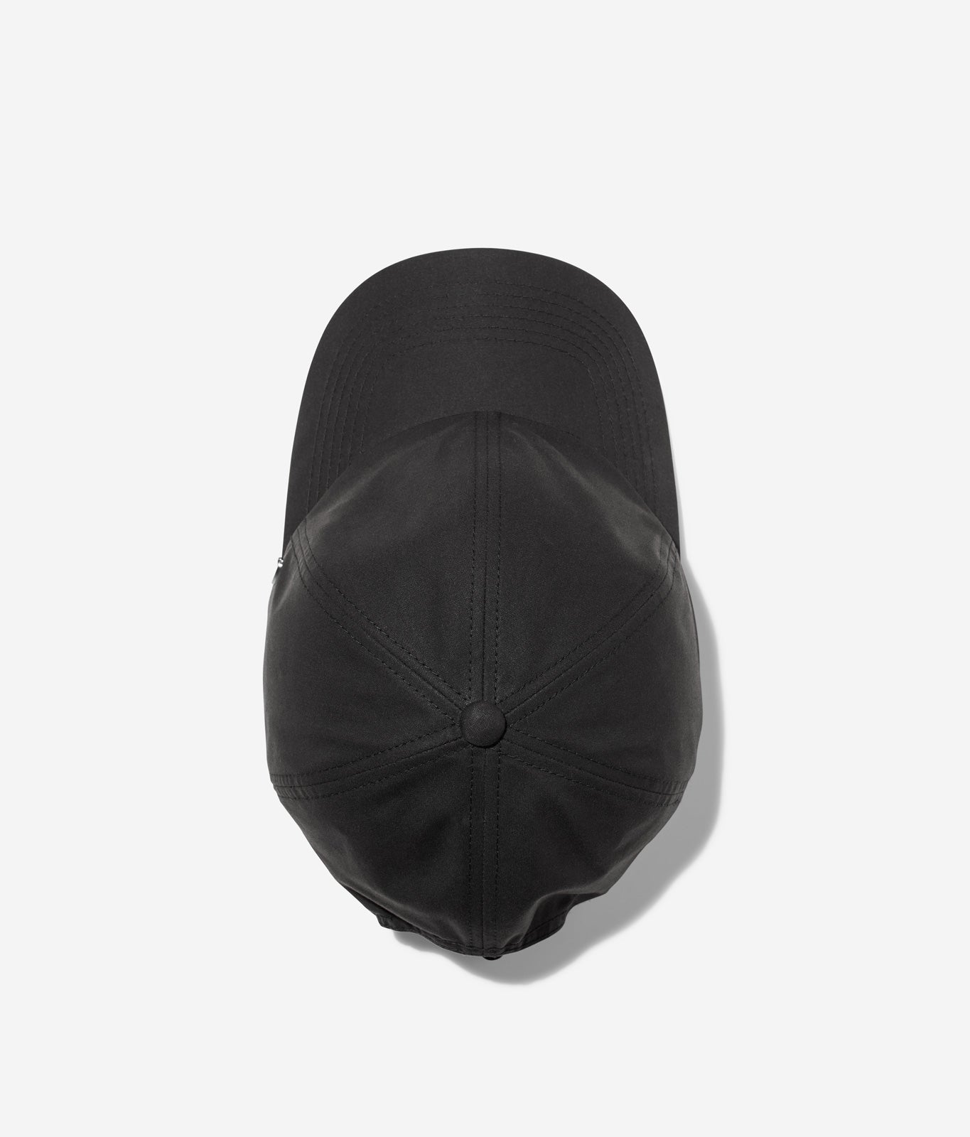 Black Ventile dad cap top view showing crown construction and stitching details