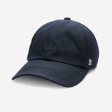 Midnight Blue Ventile dad cap angled front view showing curved brim and smooth fabric