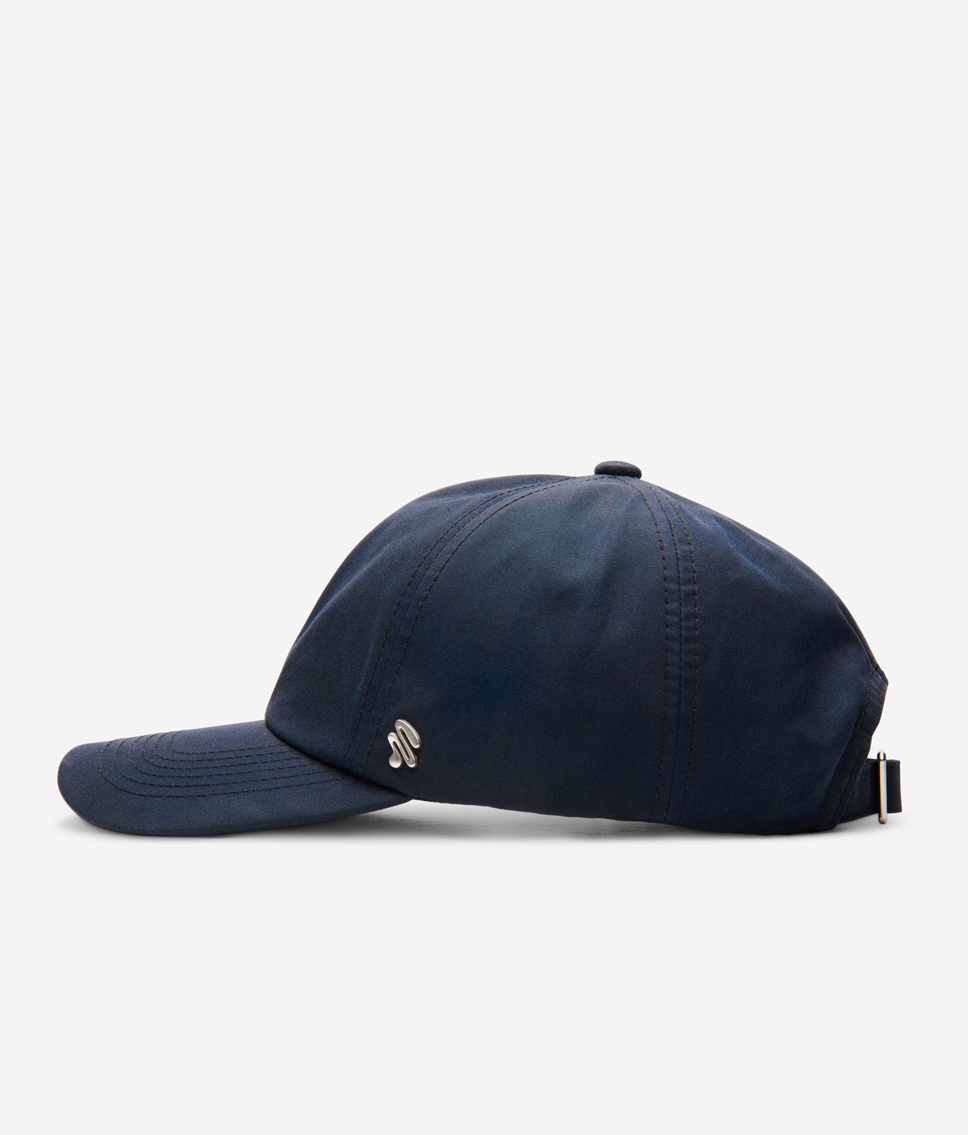 Midnight Blue Ventile dad cap side view with curved brim and metal logo detail