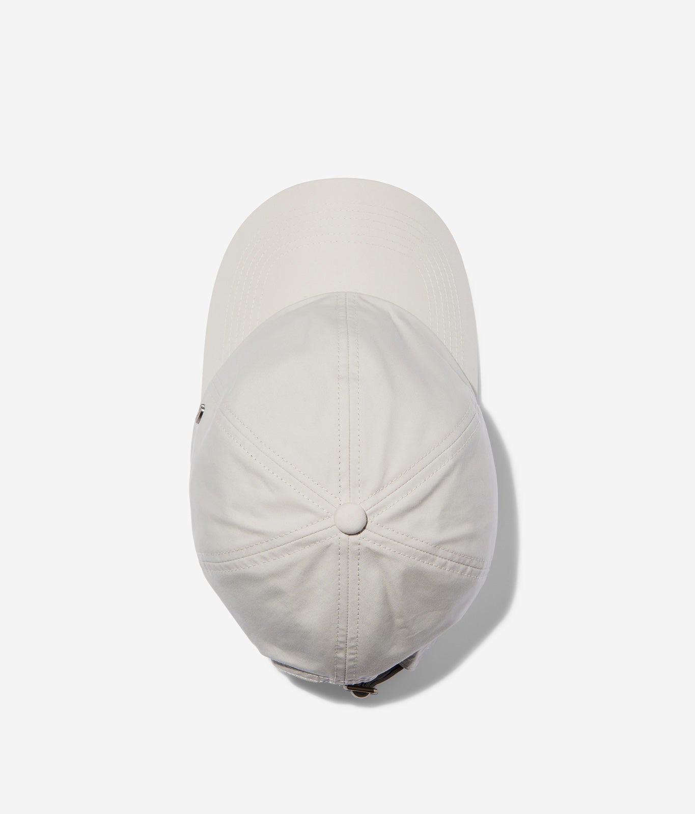 White Stone Ventile dad cap top view showing crown construction and stitching details