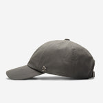 Taupe Ventile dad cap side view with curved brim and metal logo detail