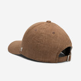 Brown linen baseball cap back view with adjustable strap and metal buckle