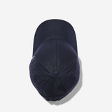 Midnight blue Ventile baseball cap top view showing crown construction and stitching details