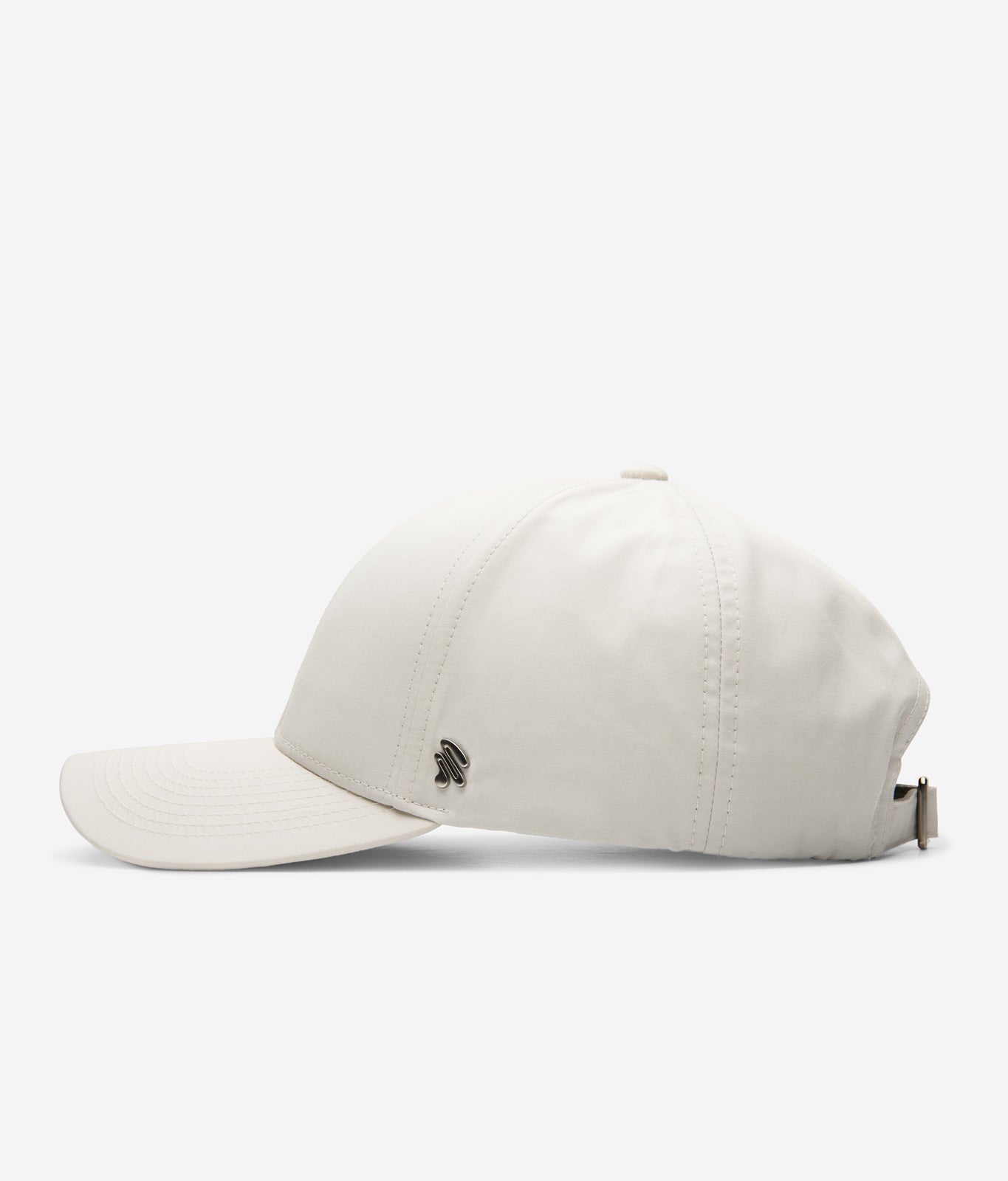White Stone Ventile baseball cap side view with curved brim and metal logo detail