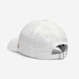 White linen baseball cap back view with adjustable strap and metal buckle